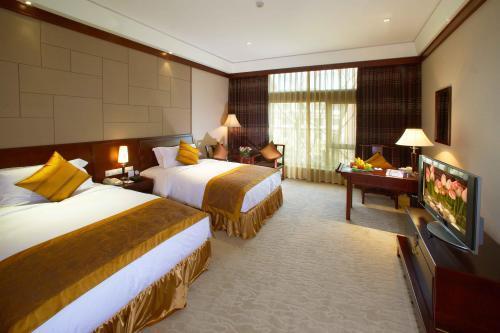 Crowne Plaza Hangzhou Xanadu Resort Номер фото